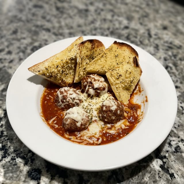 4 Meatballs in a Bowl.